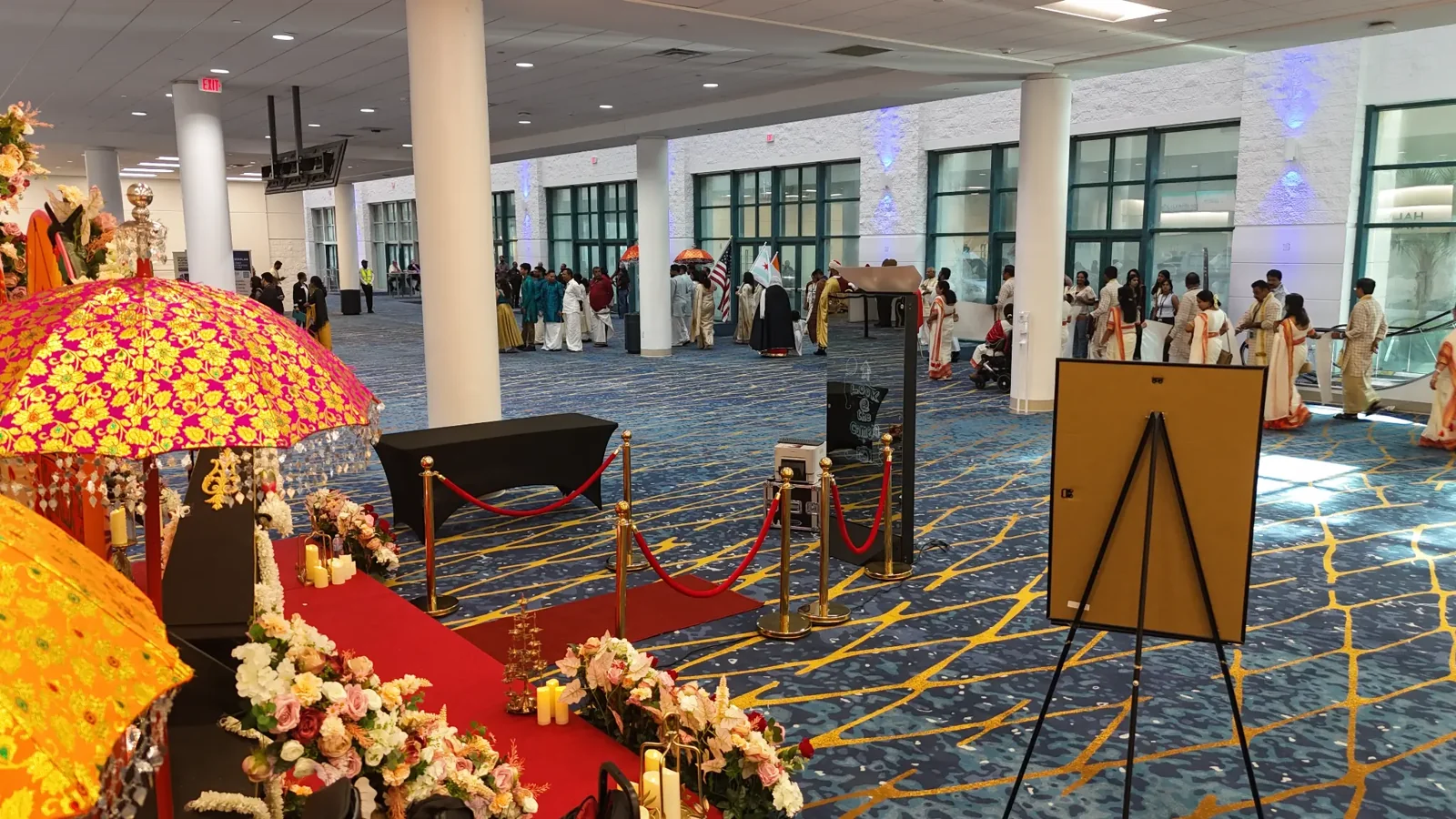 Magic Mirror photo booth and red carpet set up in a bright event venue